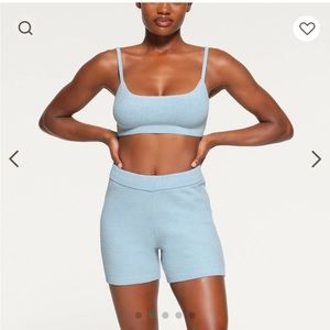 Skims Light Cozy Shorts in light blue denim color size medium